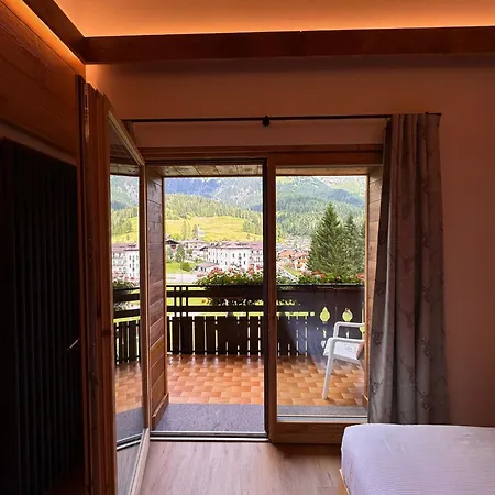 Scoiattolo Dolomites Experience Hotel Falcade
